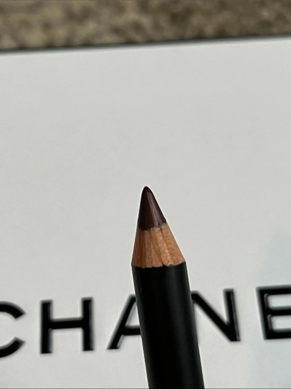 Chanel Pencil and Sharpener, brown color.